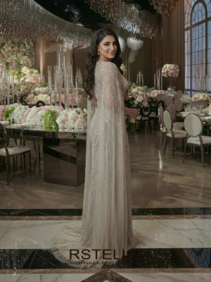 расшитое вечернее платье цвета нюд с кейпом на свадьбу