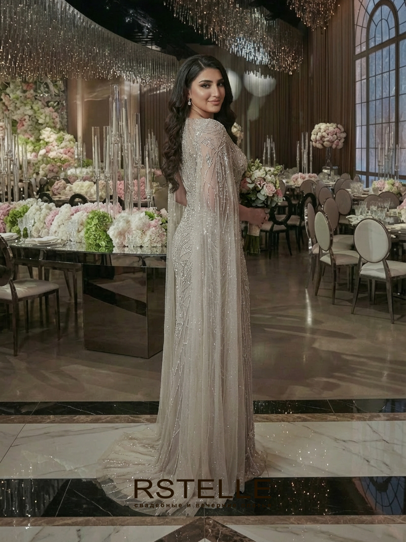 расшитое вечернее платье цвета нюд с кейпом на свадьбу