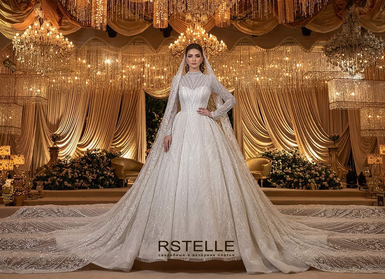 дорогое пышное расшитое свадебное платье с рукавами